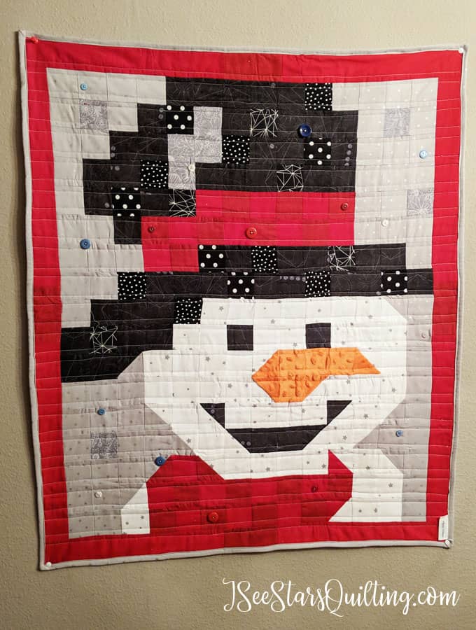 This adorable snowman wall hanging is a super cute quilt pattern that took me only 2 days to make! I used bits and pieces of scrap fabric to make it happen!