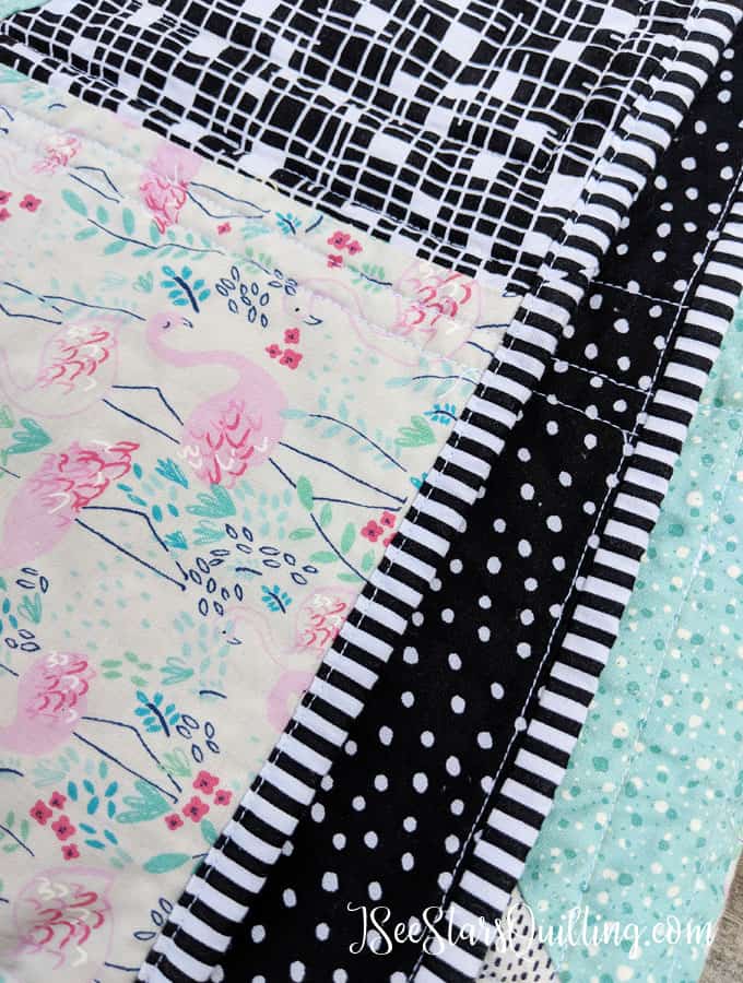 This sweet baby quilt pattern is a FREE download that I designed to be easy fro all levels of quilting! Just look at this sweet flamingo print! Its adorable! Did I mention the FREE pattern? ;) Check it out, download it and save it for later!