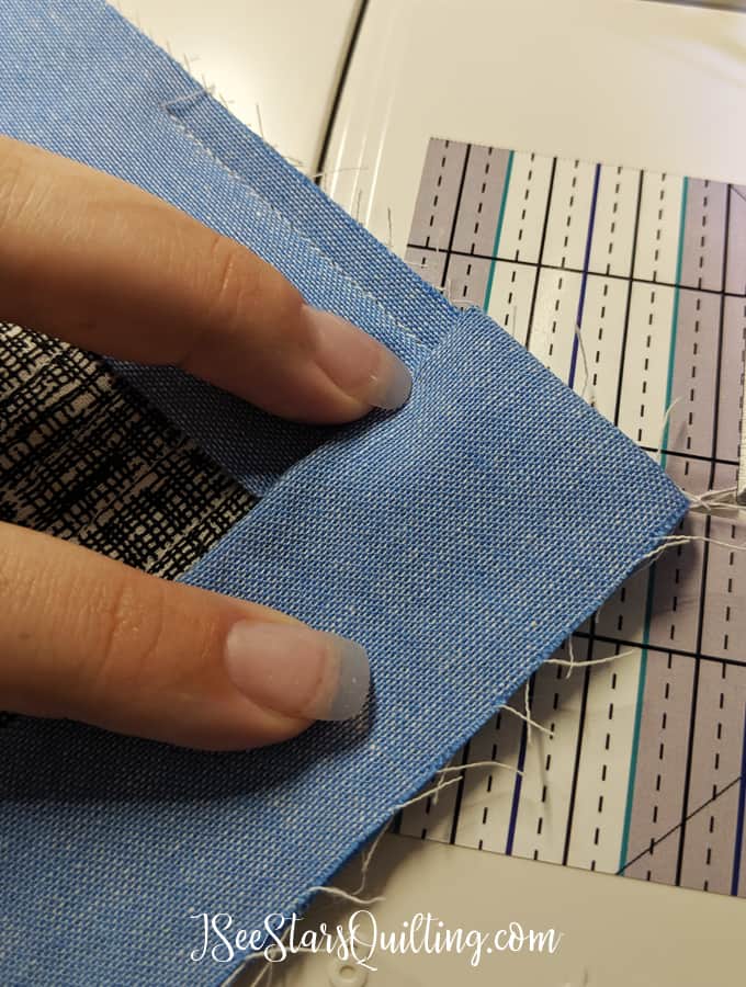 A step by step tutorial with a video and photos to show you how to create a mitered corner in your quilt binding! Don't get frustrated, I can show you how.