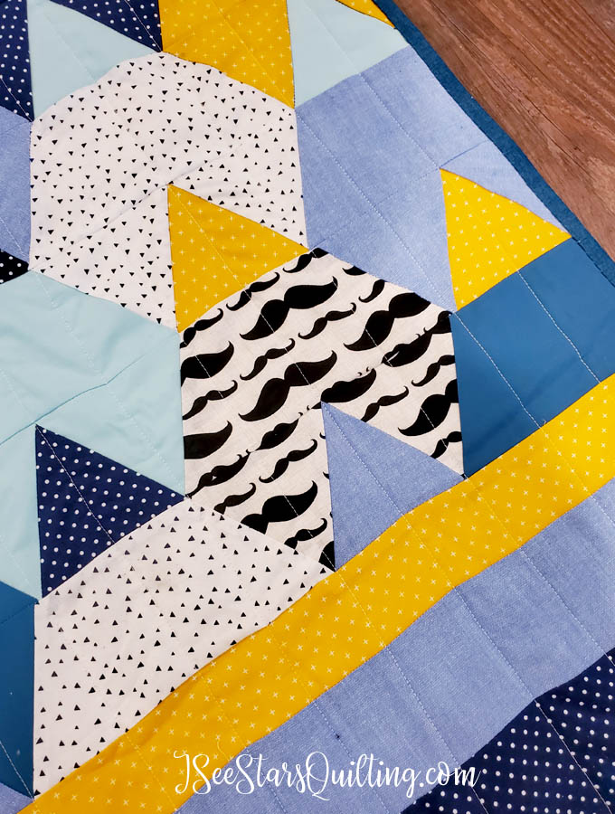 This "Baby Mountains" Hexagon quilt is made using a half-hexagon and triangle template. I love the earthy vibe that it has while still having the soft fabrics for baby quilt perfection!