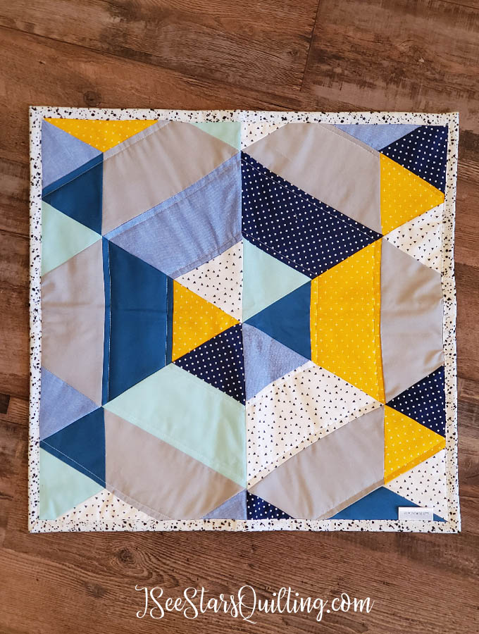 This "Baby Mountains" Hexagon quilt is made using a half-hexagon and triangle template. I love the earthy vibe that it has while still having the soft fabrics for baby quilt perfection!